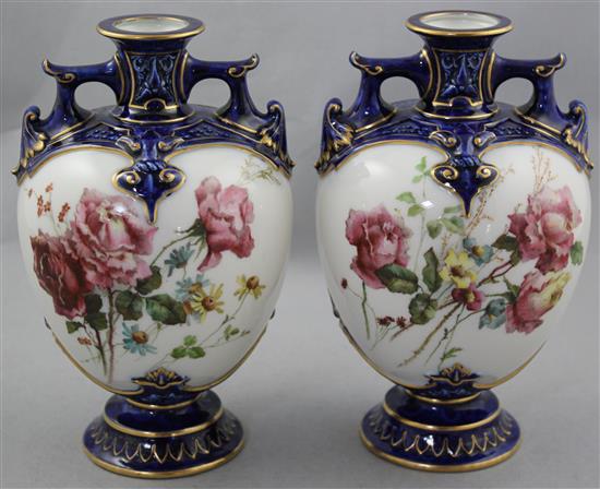 A pair of Royal Worcester ovoid two handled vases, c.1897, 19.5cm